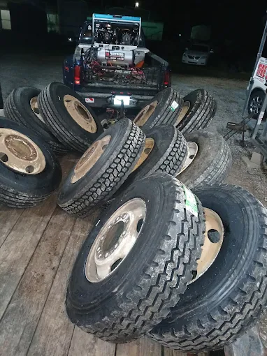 Truck bed loaded with tires at Jesse's Tires, Natchez, MS