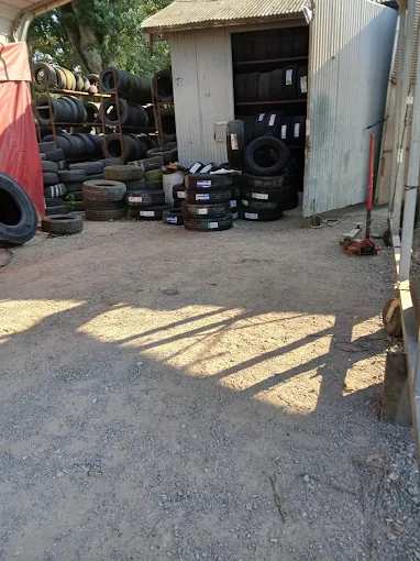Jesse's Tires shop yard with tire inventory in Natchez, MS